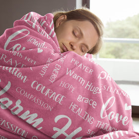 Afterprints Warm Hugs Blanket folded closeup shows plush texture and care