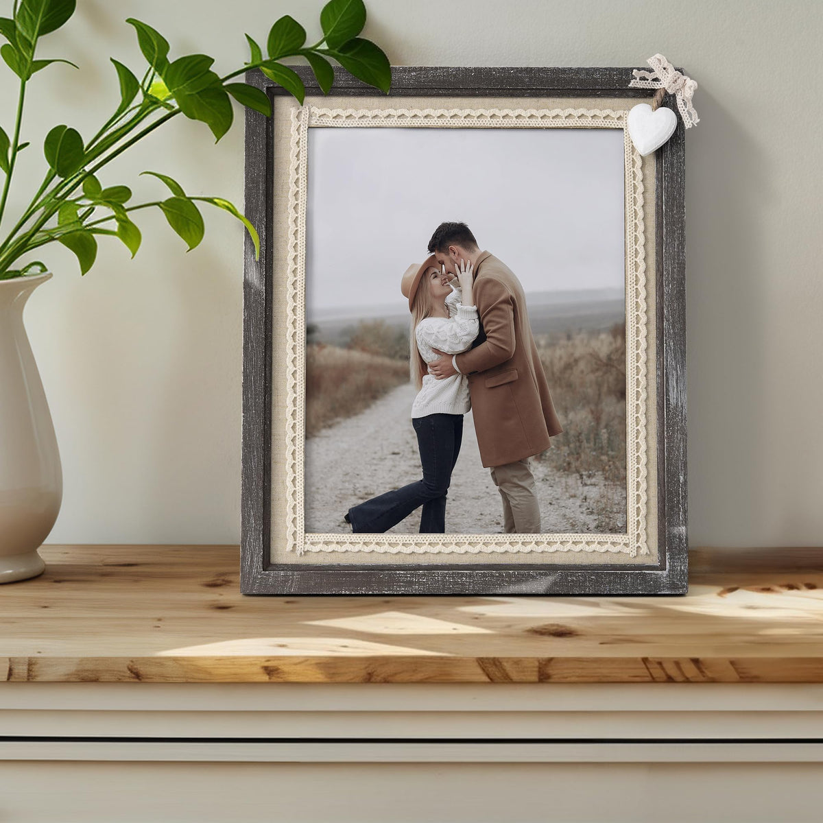 Afuly rustic wood frame with burlap heart detail adds cozy vintage flair to photos.