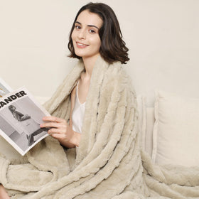 Aganear blanket on bed provides warm, breathable comfort for chilly nights