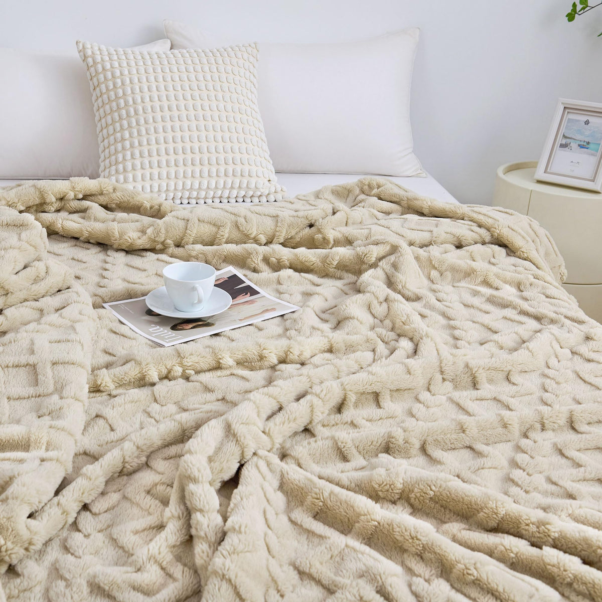 Aganear queen blanket folded on sofa enhances couch coziness