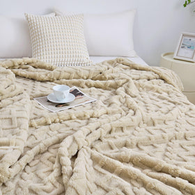 Aganear queen blanket folded on sofa enhances couch coziness