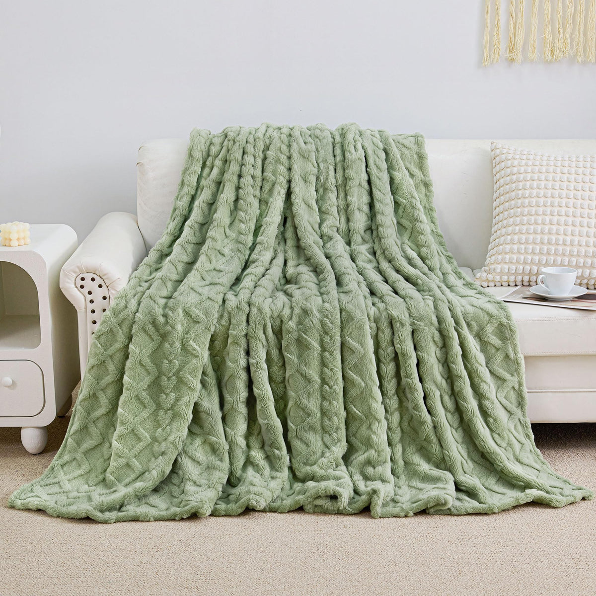 Aganear sage-green throw on neatly made bed ideal for cozy nights