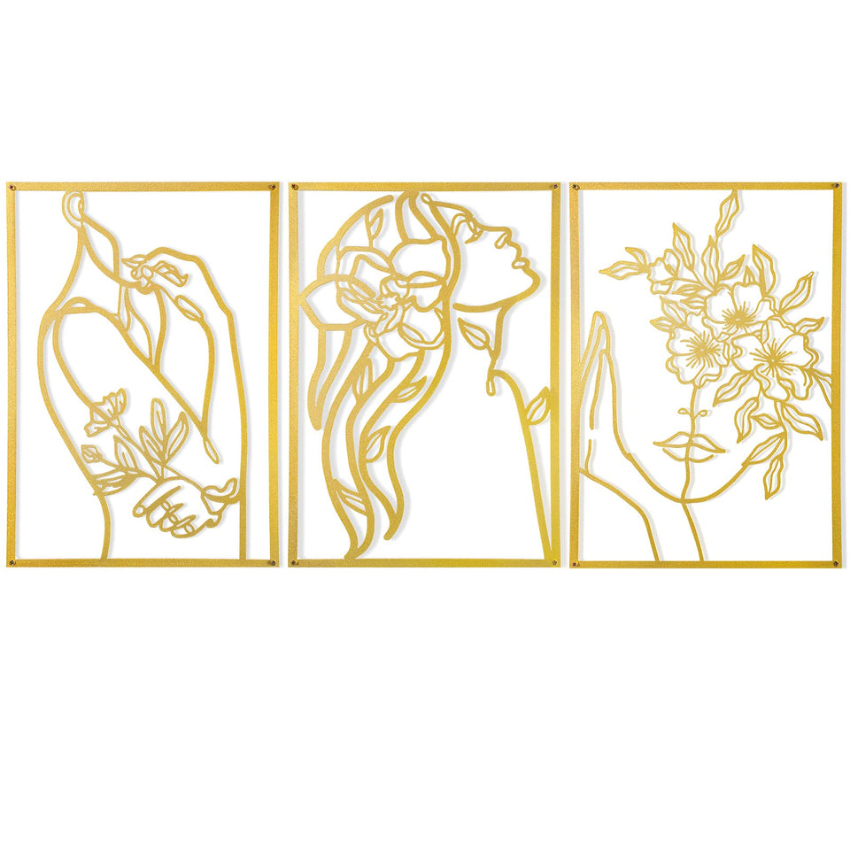 AGIOTA gold wall decor above bed with minimalist line art and warm glow.
