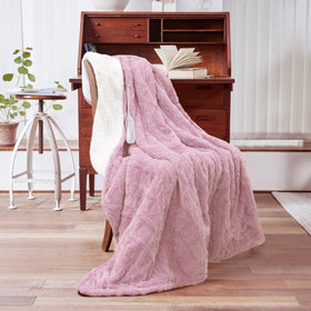 Aheadpret heated blanket on sofa for cozy evenings.