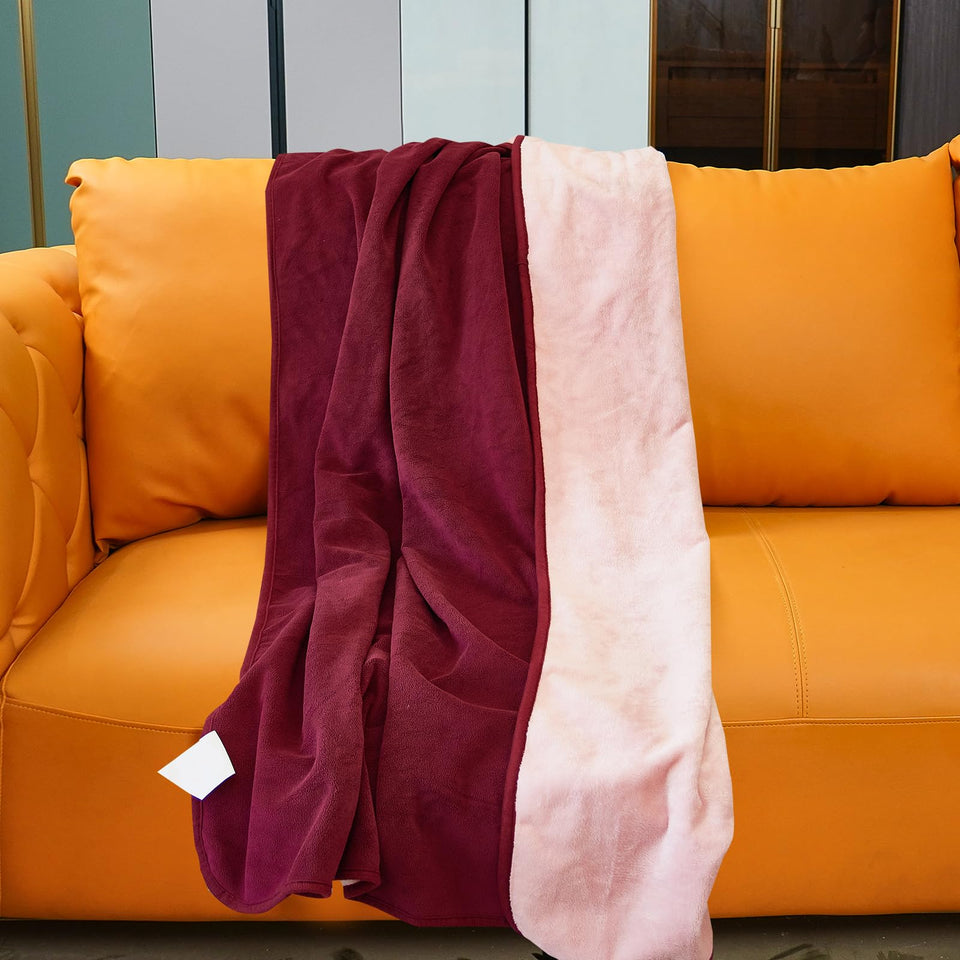 Ahinahwap waterproof blanket on bed and couch protects furniture from spills.