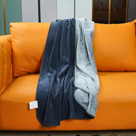 Ahinahwap waterproof blanket on bed guards against spills and accidents.