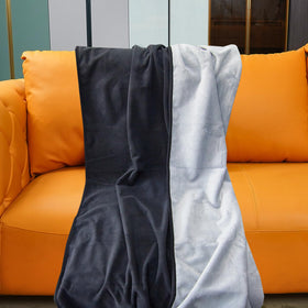 Ahinahwap waterproof blanket on bed and couch protecting against spills.