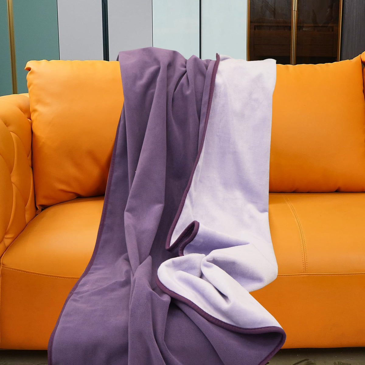 Ahinahwap waterproof blanket on bed with deep purple surface keeps furniture dry