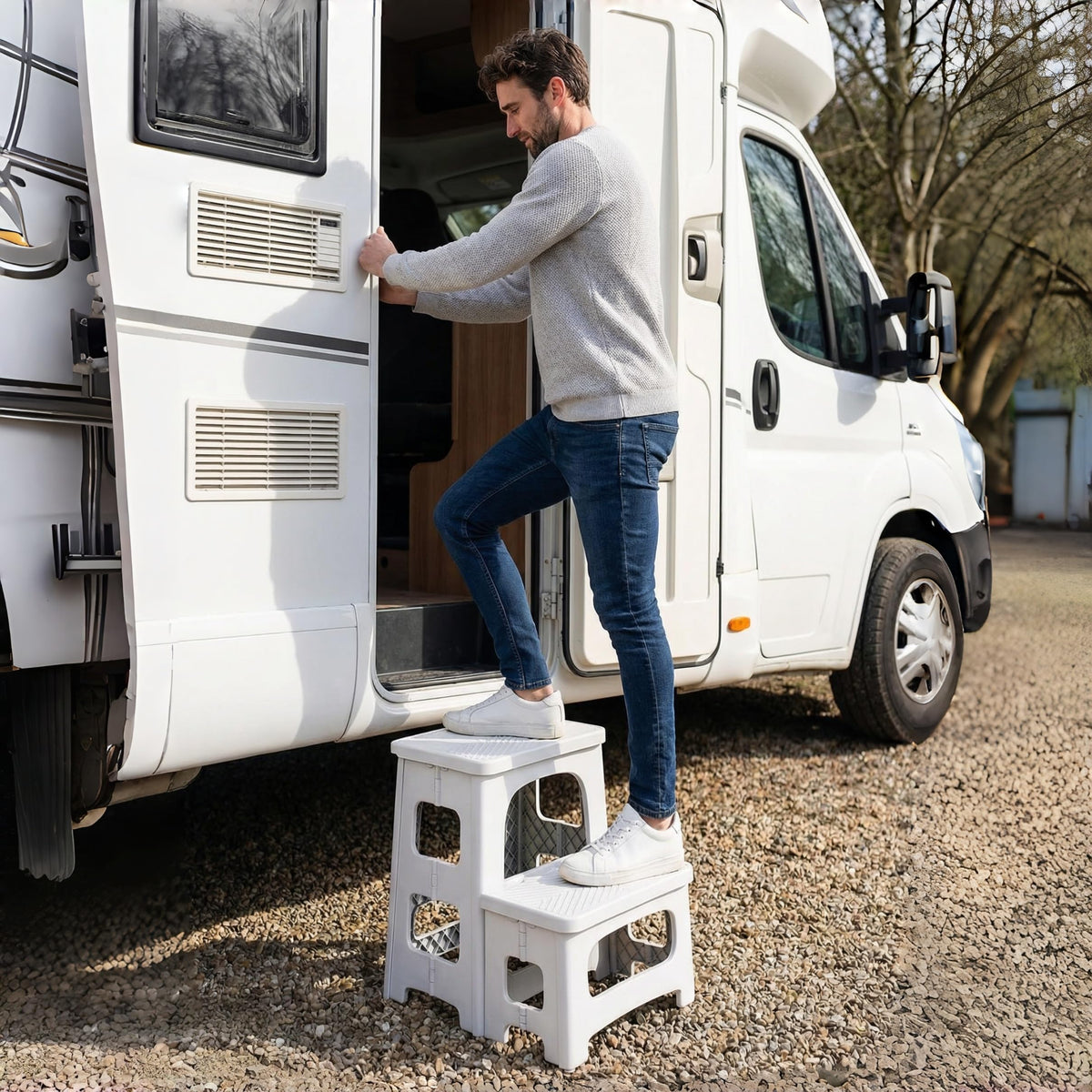 Ahxuvan folding ladder with anti-slip feet for stability.