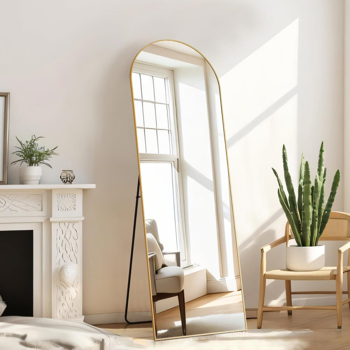 Aidoly arched mirror complements bedroom decor and space