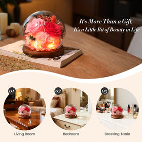Aimeye pink preserved rose in a glass dome, ready to brighten a desk.