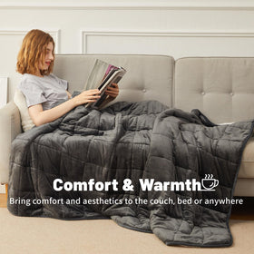 Aircliff blanket on couch demonstrates cozy decor for family movie nights.