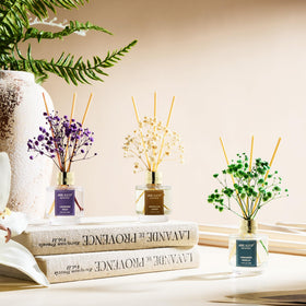 Airkeep diffuser sits on bathroom shelf adding subtle fragrance.