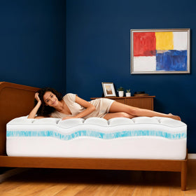 Airtree topper with full-wrap skirt securing to a thick mattress