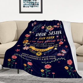 AISDE Sister Gifts Blanket on sofa ready for relaxing evenings