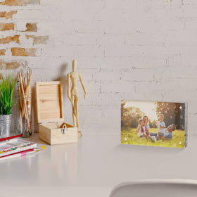 AITEE clear acrylic frame for desktop display and photos.