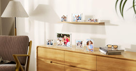 AITEE clear acrylic frame on a bright office desk for a neat display.