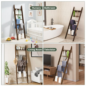 AJLS blanket ladder in living room used for towels, throws, and decor.