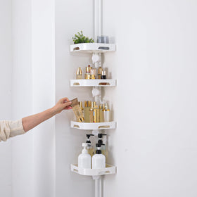 Akinbas tension pole shower caddy central drain hole promotes fast drying.