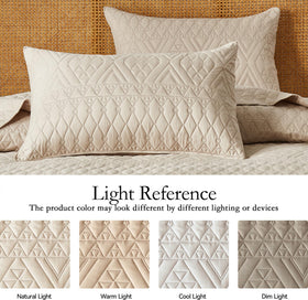 Akkialla all-season lightweight quilt draped over a bed for year-round comfort.
