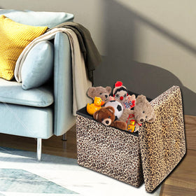 ALASDO leopard print ottoman used as a small coffee table.