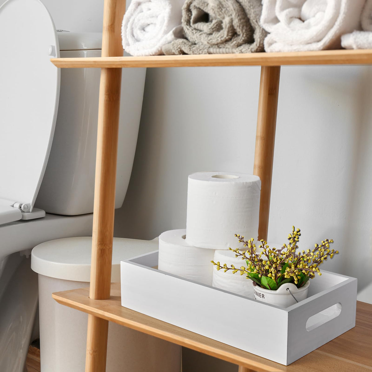 ALELION White Bathroom Basket on toilet tank, ideal for organizing toilet paper