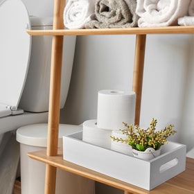 ALELION White Bathroom Basket on toilet tank, ideal for organizing toilet paper