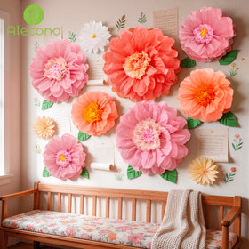 Alecono wedding backdrop setup with oversized paper blooms