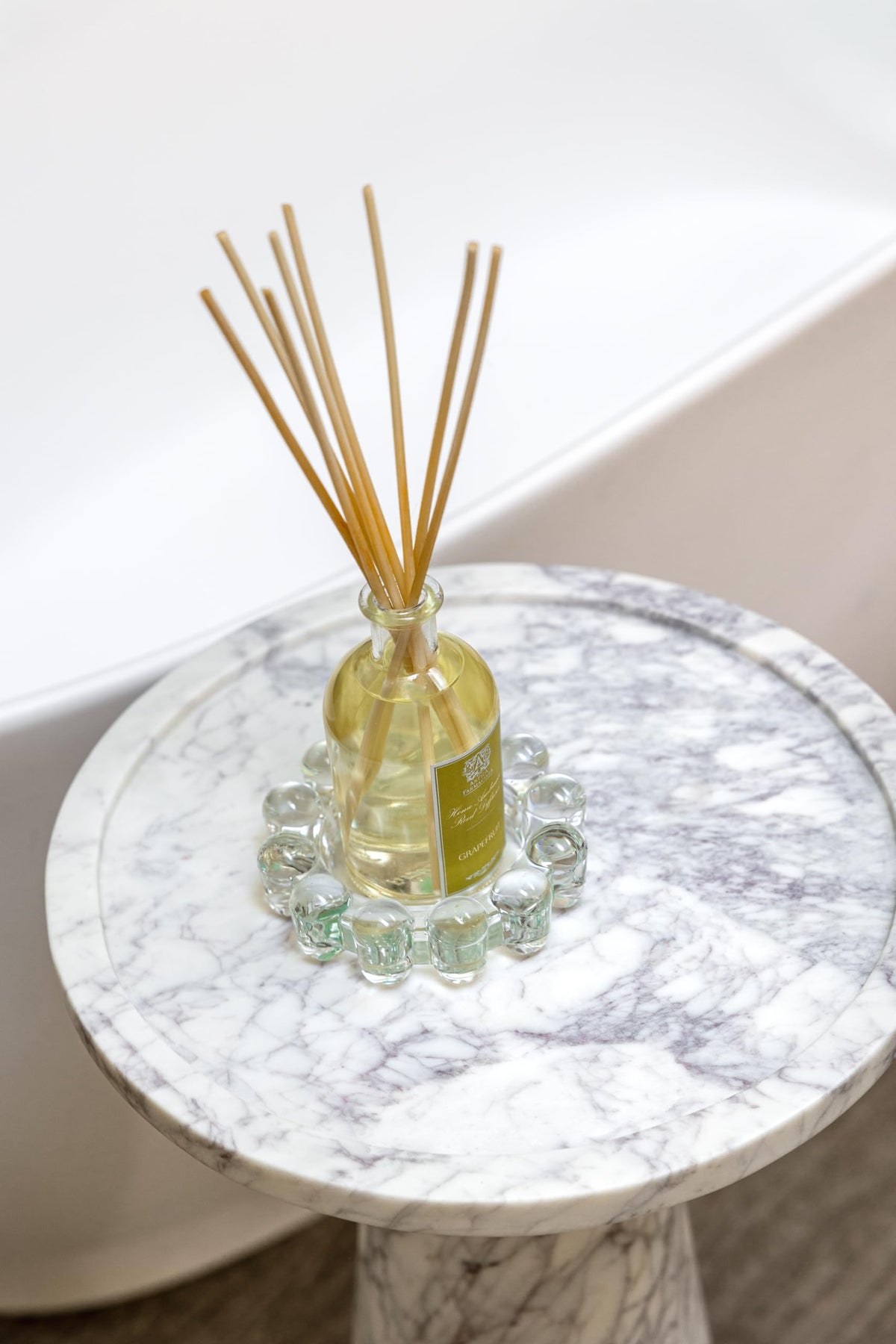 Alice Lane Bubble Dish vanity display keeps small items organized stylishly.