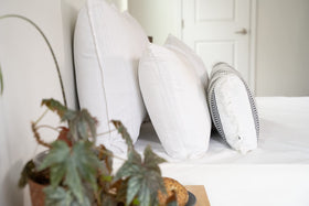 AllerEase breathable cotton fabric close-up shows soft touch and airflow for cooler nights.