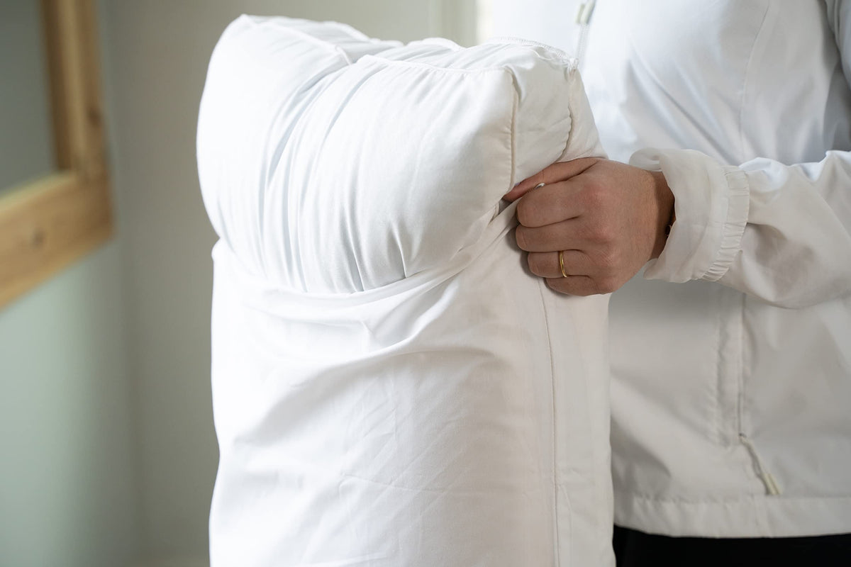AllerEase zipper pillow protector detail demonstrates secure, quiet nightly protection.