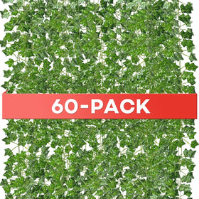 Alotiki fake vines on a bedroom wall create a lush, maintenance-free backdrop.