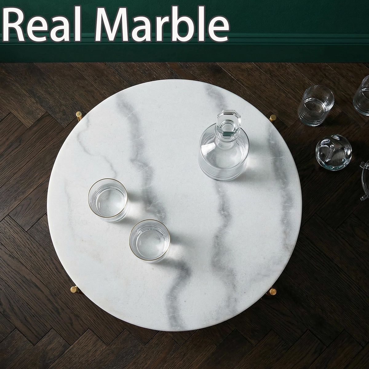 ALPOME round end table with marble top beside sofa.
