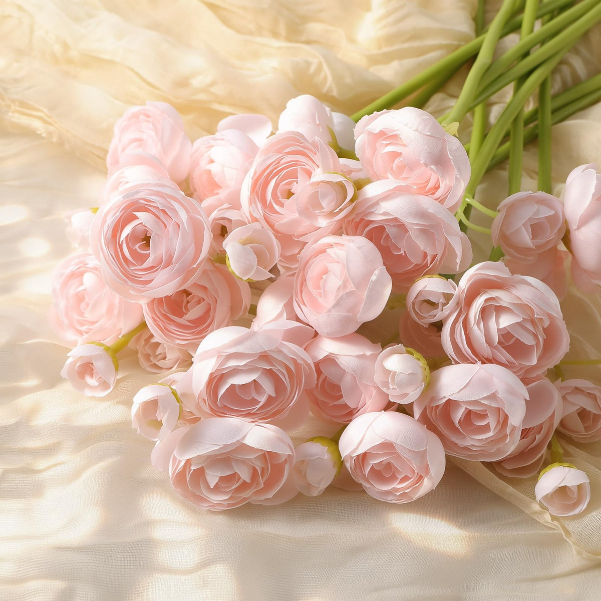 Alupssuc pink ranunculus accents add romantic charm to rooms.
