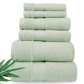 Alusa Home towel folded on rack, showcasing plush softness and premium bamboo blend.