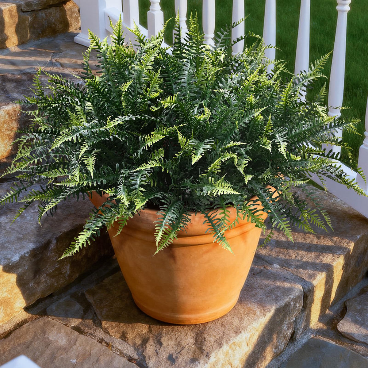 Alyptus fern arrangement showcases lifelike texture and easy setup.