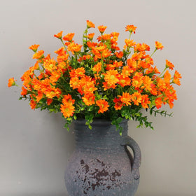 Alyptus plastic leaves and silk blooms for durable greenery.