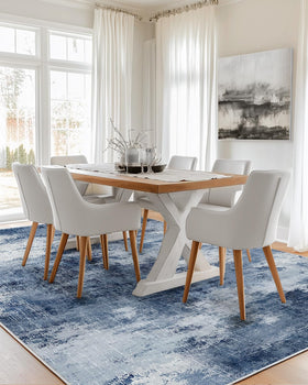 AMADA HOMEFURNISHING washable rug edge detail supports easy cleaning in busy homes.