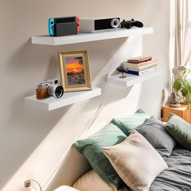 AMADA HOMEFURNISHING floating shelves side view highlighting hidden brackets
