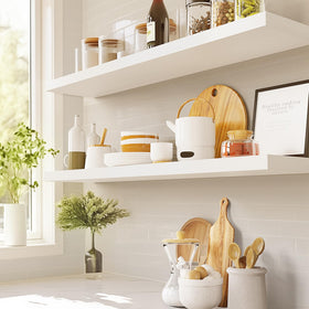 AMADA HOMEFURNISHING large-capacity shelves maximize wall storage for décor and essentials
