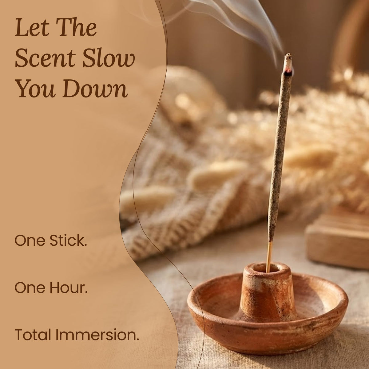 Amae incense stick burning softly, filling room with forest-like aroma.