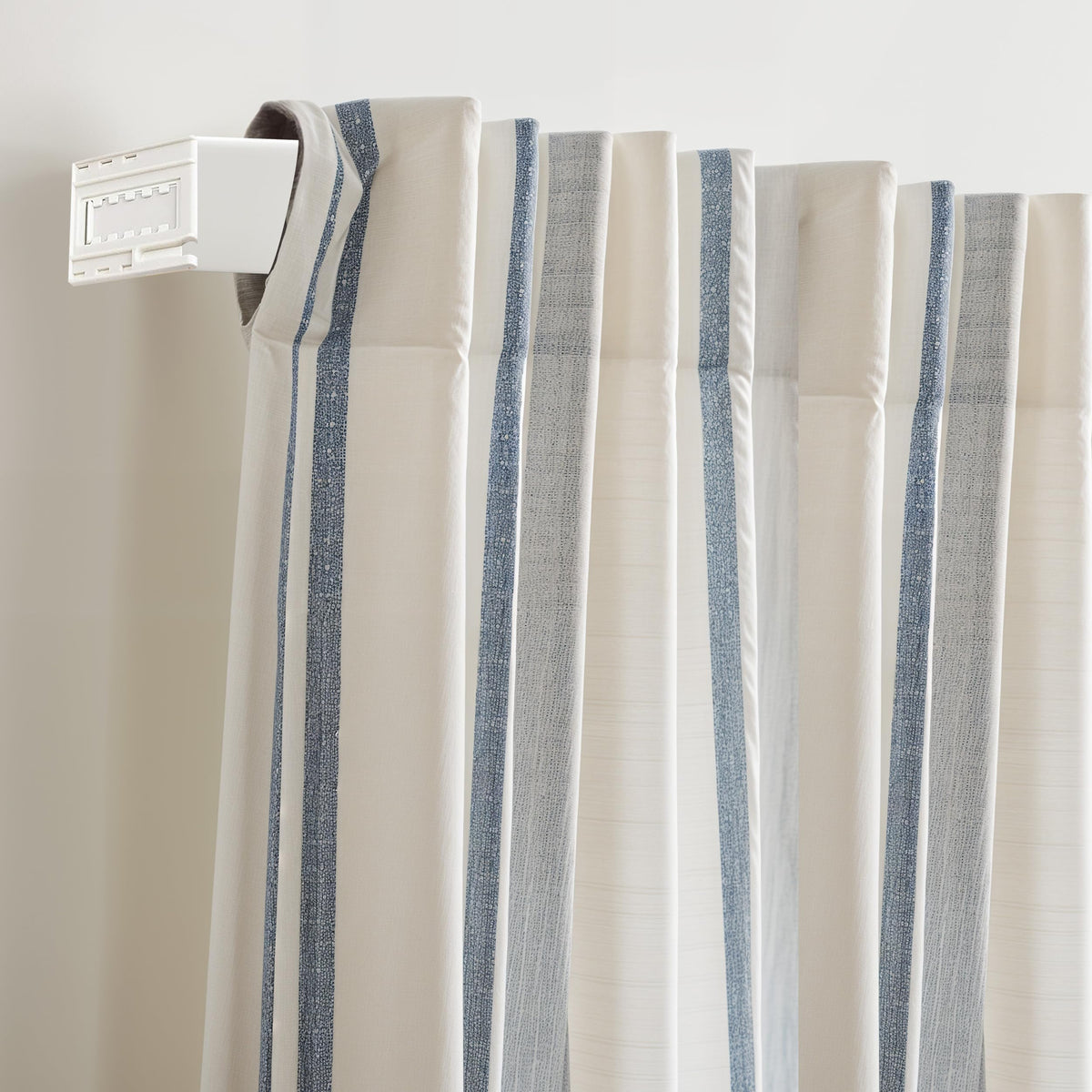 Amazing Drapery Hardware durable steel with white finish complements any decor.