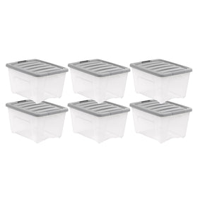 Amazon Basics 32-Quart clear storage bin with lid for easy content identification.