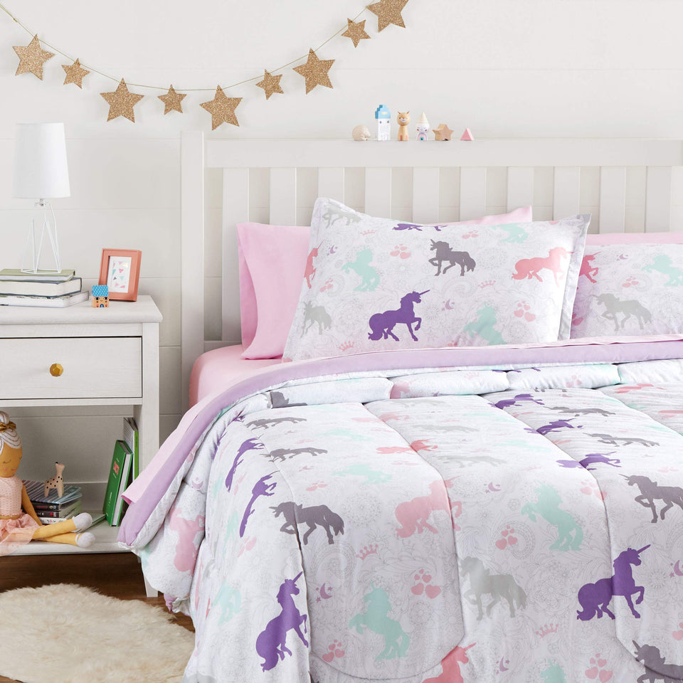 Amazon Basics bed-in-a-bag unicorns comforter close-up showing plush warmth for all-season use