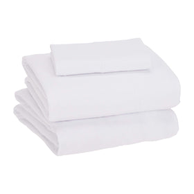 Amazon Basics fitted sheet on mattress shows secure stretch up to 14 inches