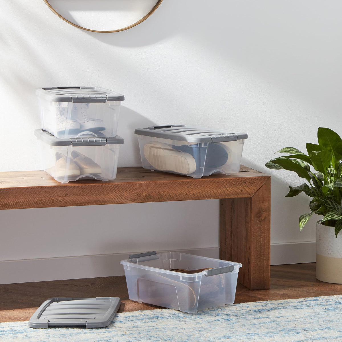 Amazon Basics stackable bin shown under-bed storage for space-saving organization.