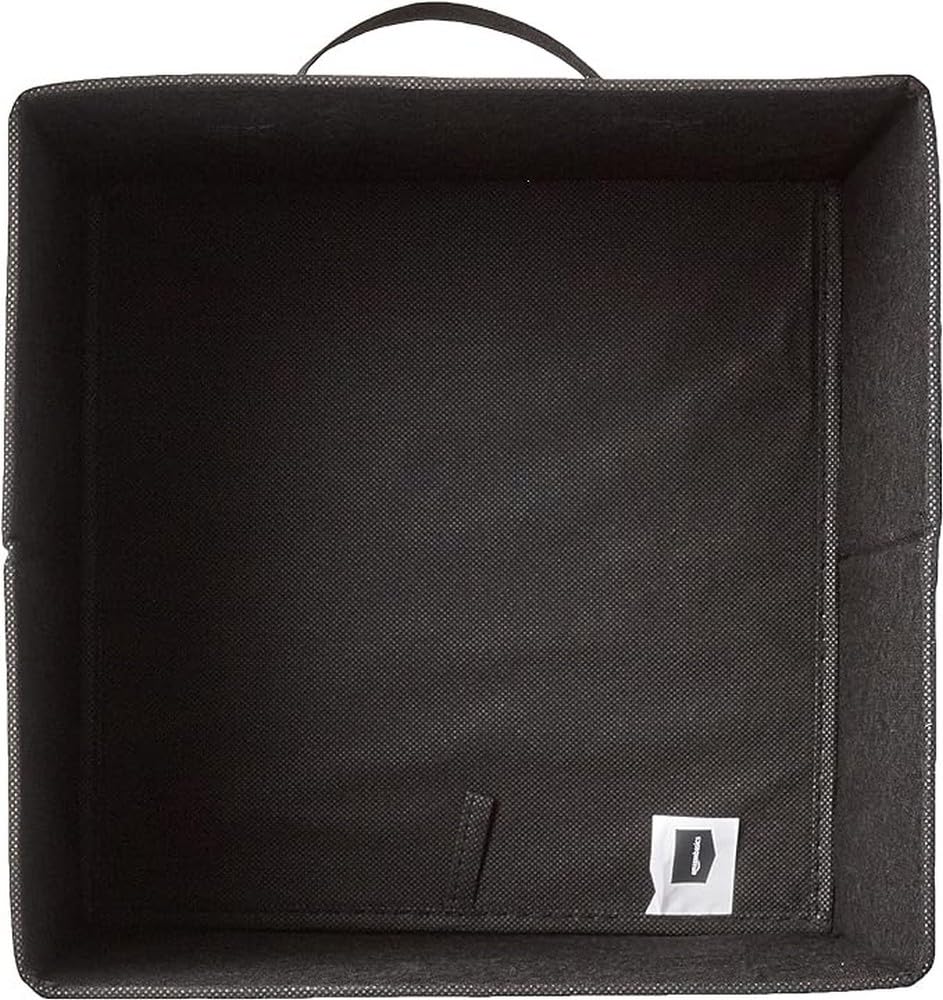 Amazon Basics collapsible bin on a shelf showing organized cubbies.