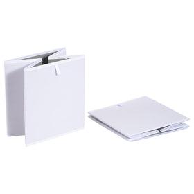 Amazon Basics white collapsible cube bin collapsed for compact storage