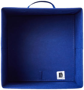 Amazon Basics storage cubes on a shelf for organized open-top bin use.