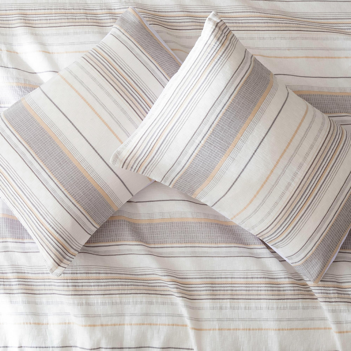 Amazon Basics pillow shams pair with the comforter for a coordinated look.